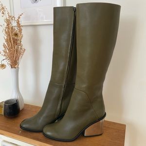Olive green Aldp leather boots with reflective silver heel